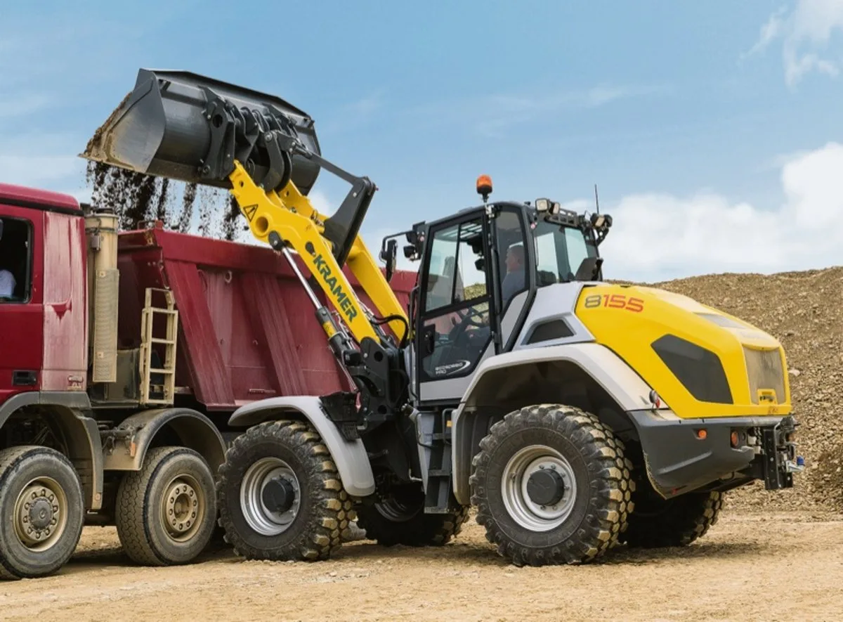 Kramer 8155 wheel loader loading a dump truck